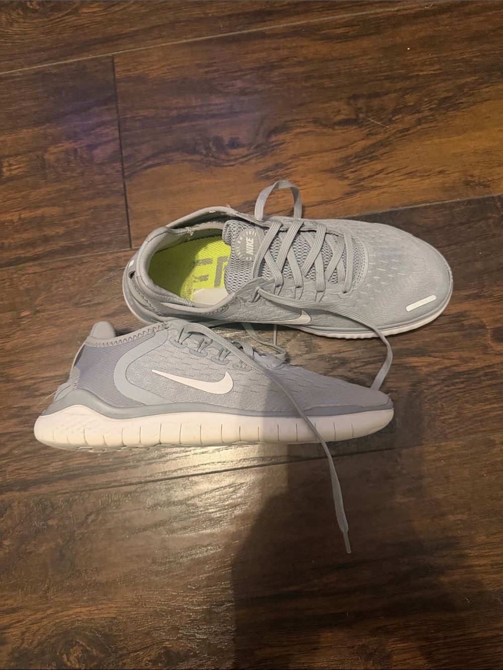 Nike Women's Light Gray Free Runs